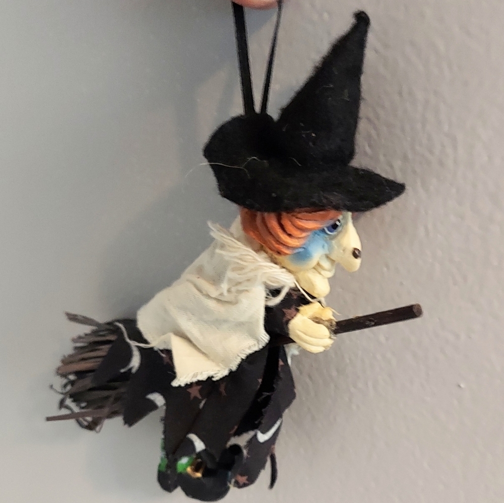 Vtg Witch on Broom Ornament Halloween Porcelain Dangling Legs Face Black Cape